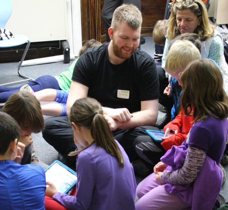Þorgeir helping children learn coding with Box Island